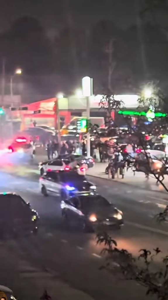 A lawless mob wreaked fiery havoc on a Queens intersection during a late-night car takeover as local lawmakers demand a crackdown on these unhinged meetups. youtube/@PhilWongNYC