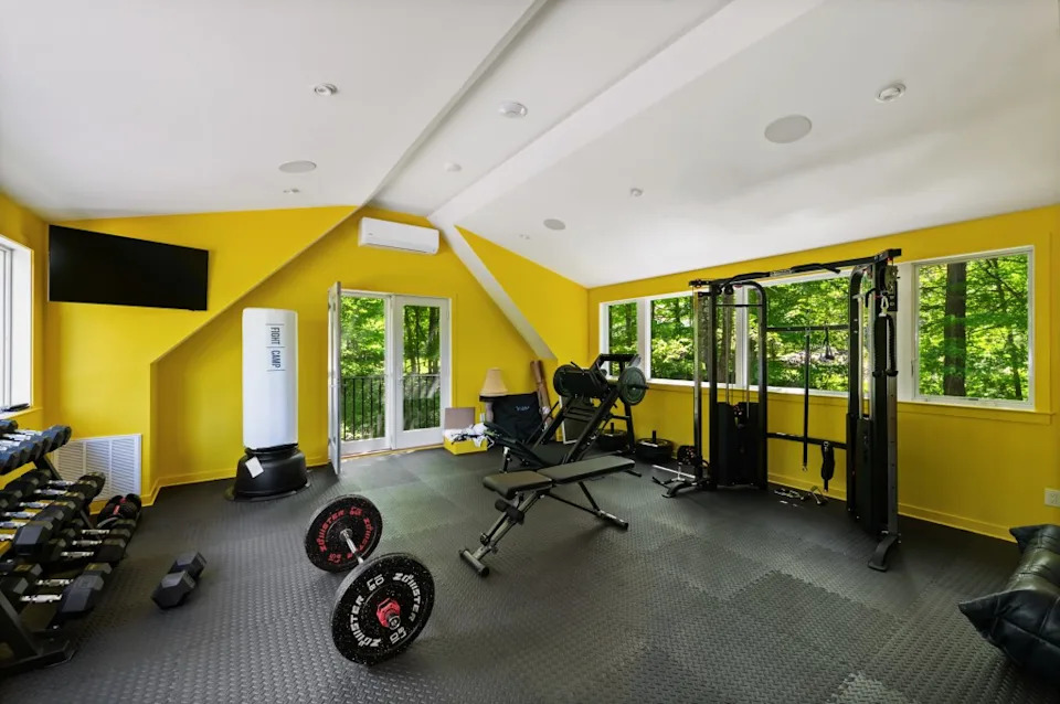 Davidson turned one of the rooms into a fitness center. Ginnel x Modern Angles