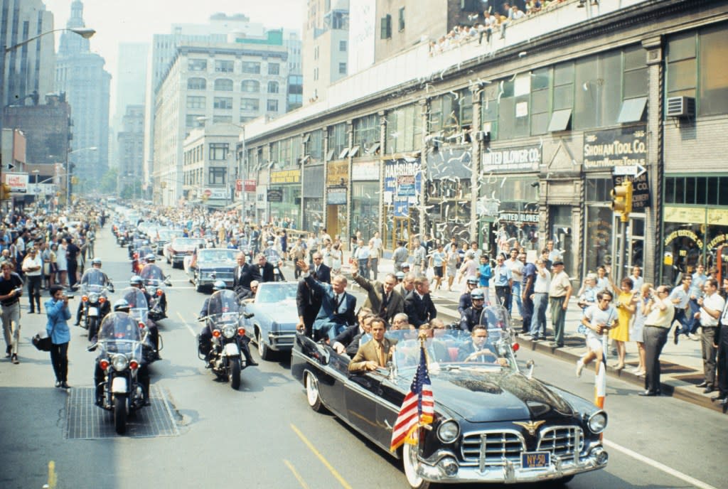 Apollo 11 astronauts wave from open car after City Hall ceremony in 1969. Left to right: Michael Collins, Buzz Aldrin and Neil Armstrong. In front of them in car are then-New York City’s Mayor John Lindsay and then-United Nations Secretary General U Thant. Bettmann Archive