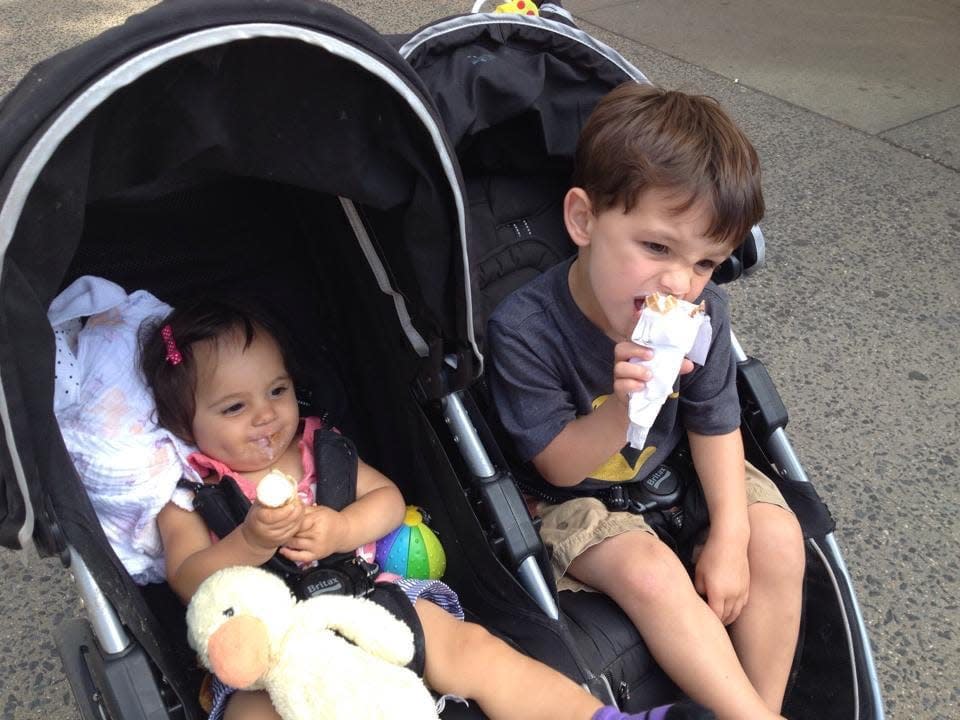 The writer's children eating ice cream on the streets of NYC before they moved to TX.