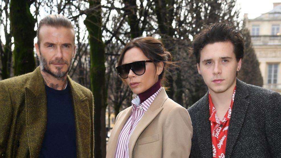 PARIS, FRANCE - JANUARY 18:  David Beckham, Victoria Beckham and Brooklyn Beckham attend the Louis Vuitton Menswear Fall/Winter 2018-2019 show as part of Paris Fashion Week on January 18, 2018 in Paris, France.  (Photo by Pascal Le Segretain/Getty Images)