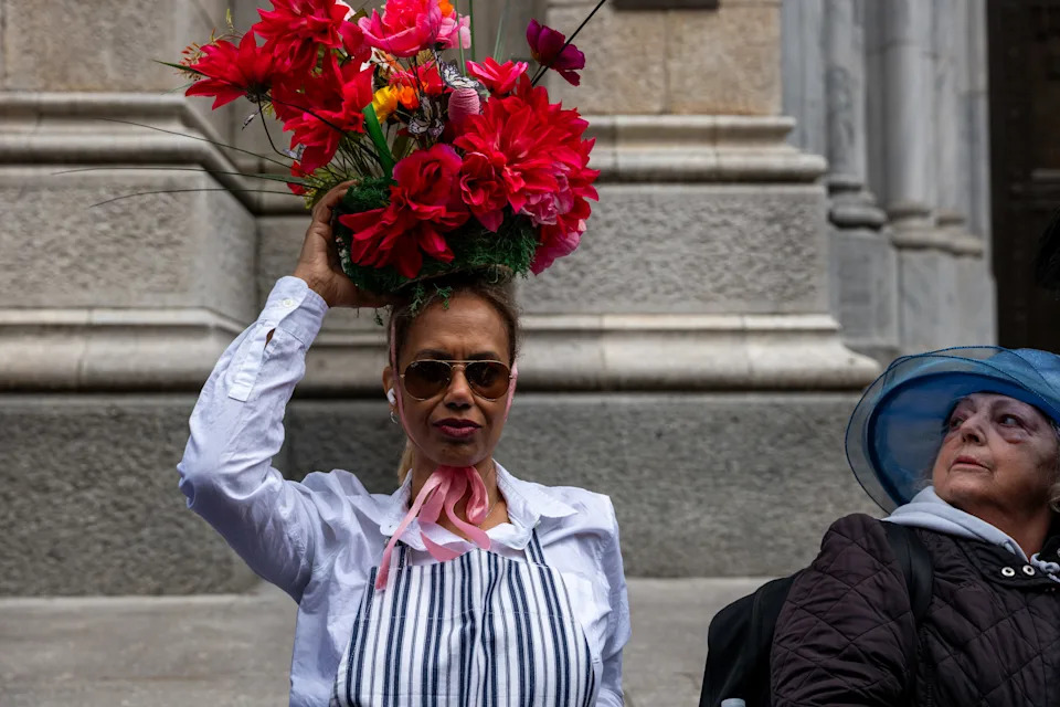 People dress in elaborate hats and costumes during the annual Easter Bonnet Parade and Festival outside of St. Patrick's Cathedral on Fifth Avenue on April 05, 2026 in New York City. (Photo by Spencer Platt/Getty Images)