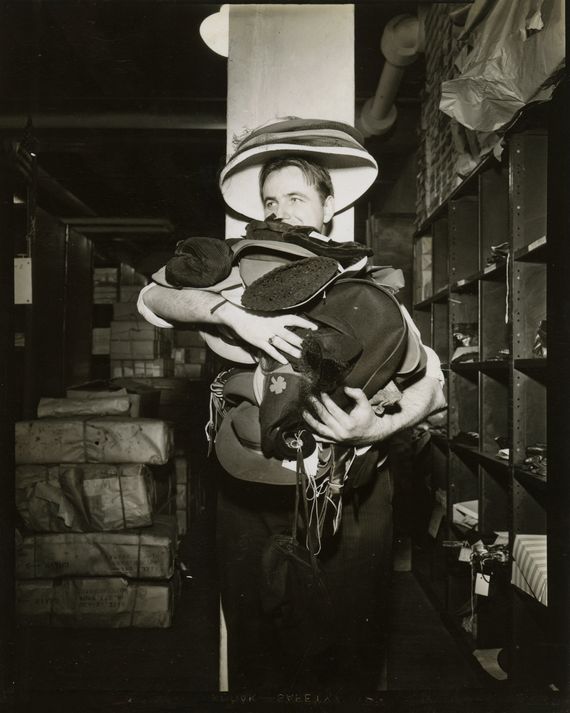 Joseph A. Duffy, a subway-lost-and-found staffer, poses in March 1946 with one month’s worth of turned-in hats.