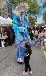 Children were enchanted by the performers at the Festival. Photo: Carol Marino