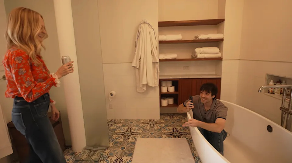 Her relaxing bathroom features a large soaking tub.