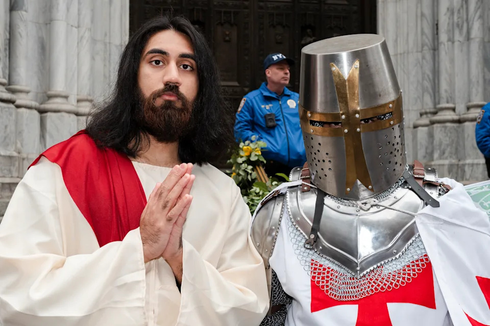 Participants pose during the New York City Easter Parade and Bonnet Festival and Parade in front of St. Patrick's Cathedral on April 05, 2026 in New York City. (Photo by Craig T Fruchtman/Getty Images)