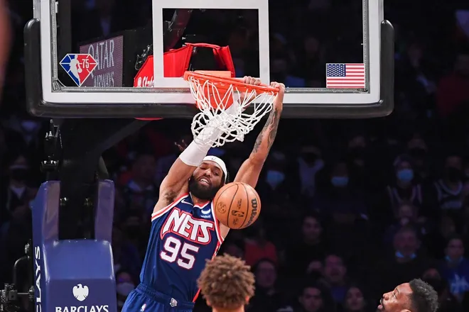 Jan 26, 2022; Brooklyn, New York, USA; Brooklyn Nets guard DeAndre' Bembry (95) dunks the ball against the Denver Nuggets during the second quarter at Barclays Center. Mandatory Credit: Dennis Schneidler-USA TODAY Sports
