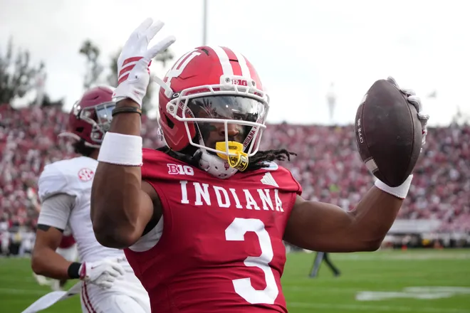 Jan 1, 2026; Pasadena, CA, USA; Indiana Hoosiers wide receiver Omar Cooper Jr. (3) celebrates after catching a 1-yard touchdown pass in the second quarter against the Alabama Crimson Tide during the 2026 Rose Bowl and quarterfinal game of the College Football Playoff at Rose Bowl Stadium. Mandatory Credit: Kirby Lee-Imagn Images