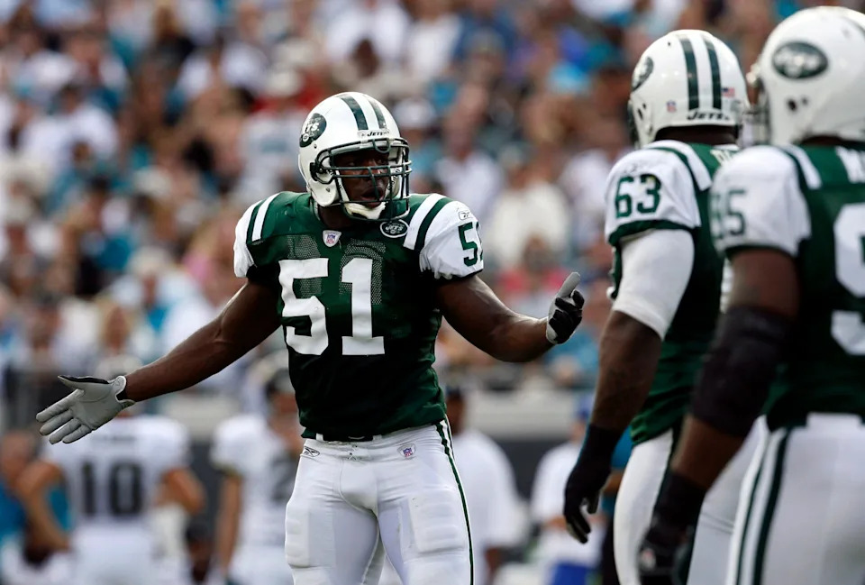 New York Jets linebacker Jonathan Vilma reacts to being called for a penalty.