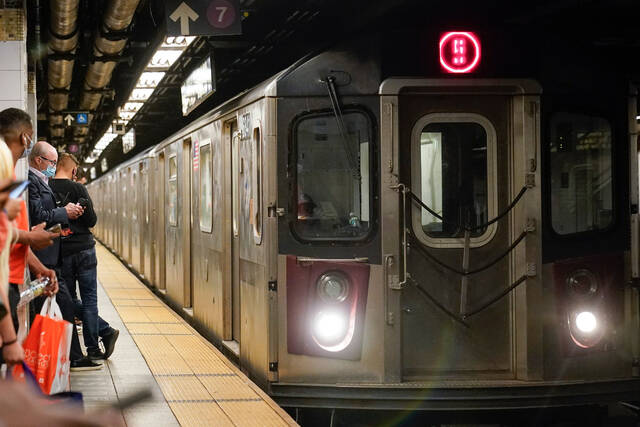Stabbings on New York subway leaves 3 hurt as officers shoot knife-wielding man
