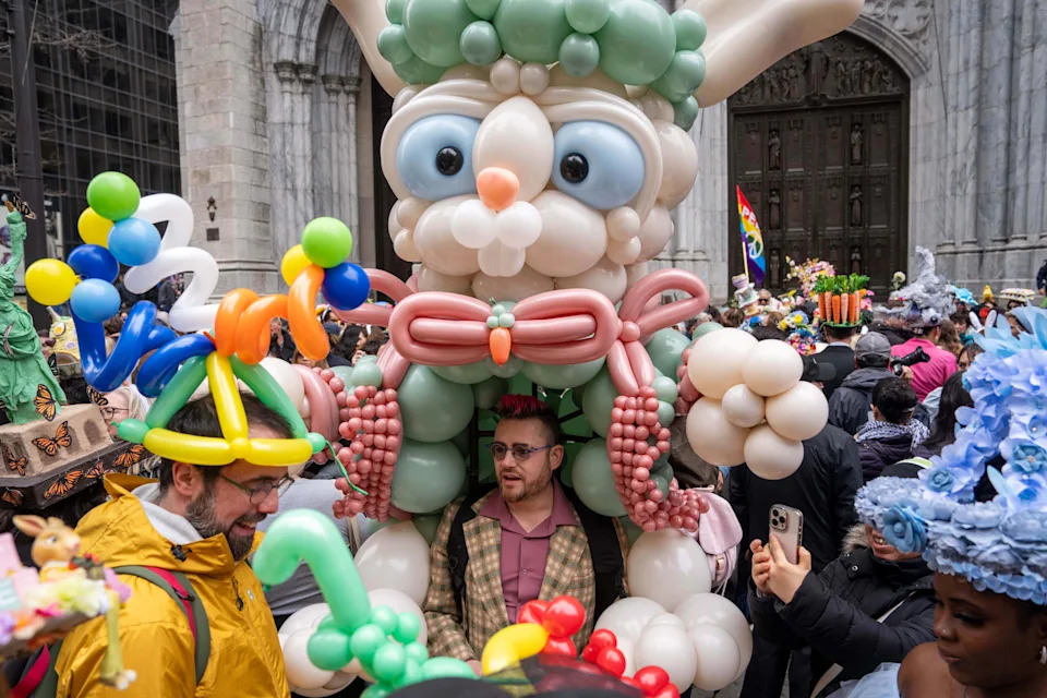 People wearing balloon costumes participate in the Easter Parade and Bonnet Festival on Fifth Avenue, Sunday, April 5, 2026, in New York. (AP Photo/Adam Gray)