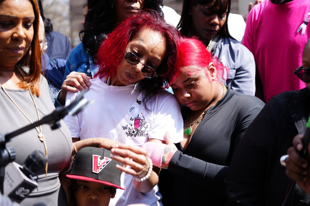 Mourners at a vigil for 7-month-old Kaori Patterson-Moore, who was shot by a stray bullet that may have been meant for her father. James Keivom