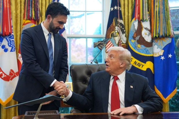 President Donald Trump shakes hands with New York City Mayor-elect Zohran Mamdani in the Oval Office of the White House on Friday.