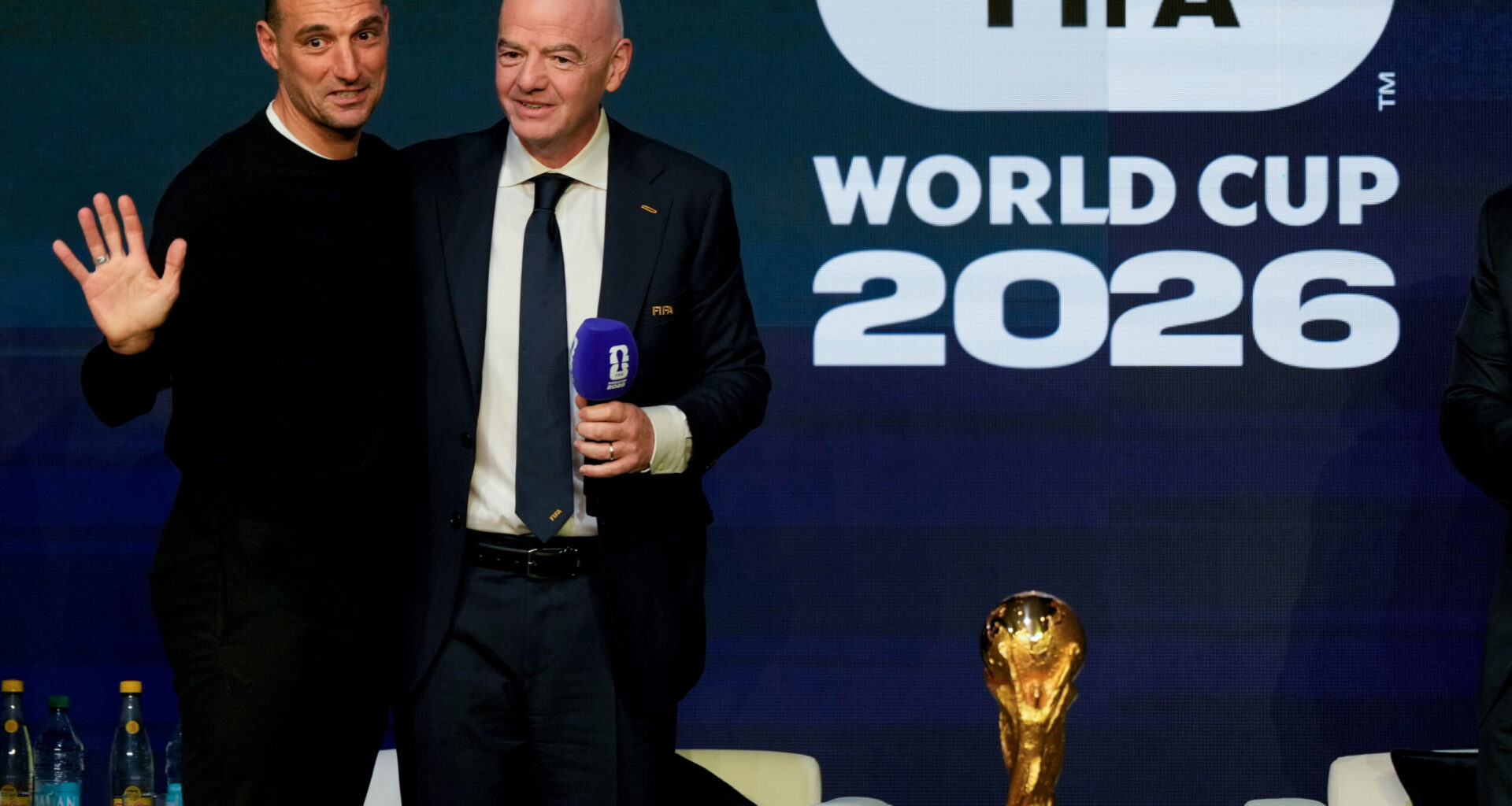 FIFA President Gianni Infantino, right, greets Argentina's coach Lionel Scaloni during the match schedule reveal for the 2026 soccer World Cup in Washington, Saturday, Dec. 6, 2025. Photo: Chris Carlson/AP