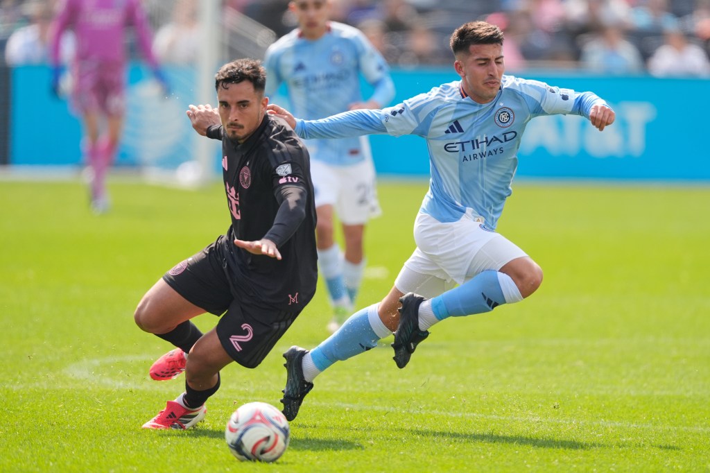 Inter Miami's Gonzalo Luján, left, and New York City FC's Nicolás Fernández compete for the ball during the first half of an MLS soccer game at Yankee Stadium in New York, Sunday, March 22, 2026.