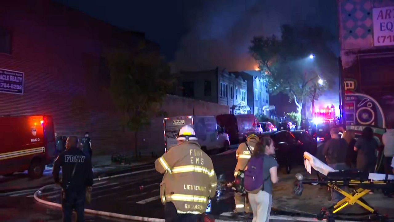 The fire took several hours to contain, sending heavy smoke into the surrounding neighborhood. (Spectrum News NY1)