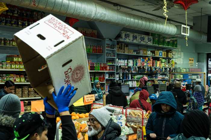 Shoppers fill the popular Al Aqsa Supermarket in Bangla Bazaar.