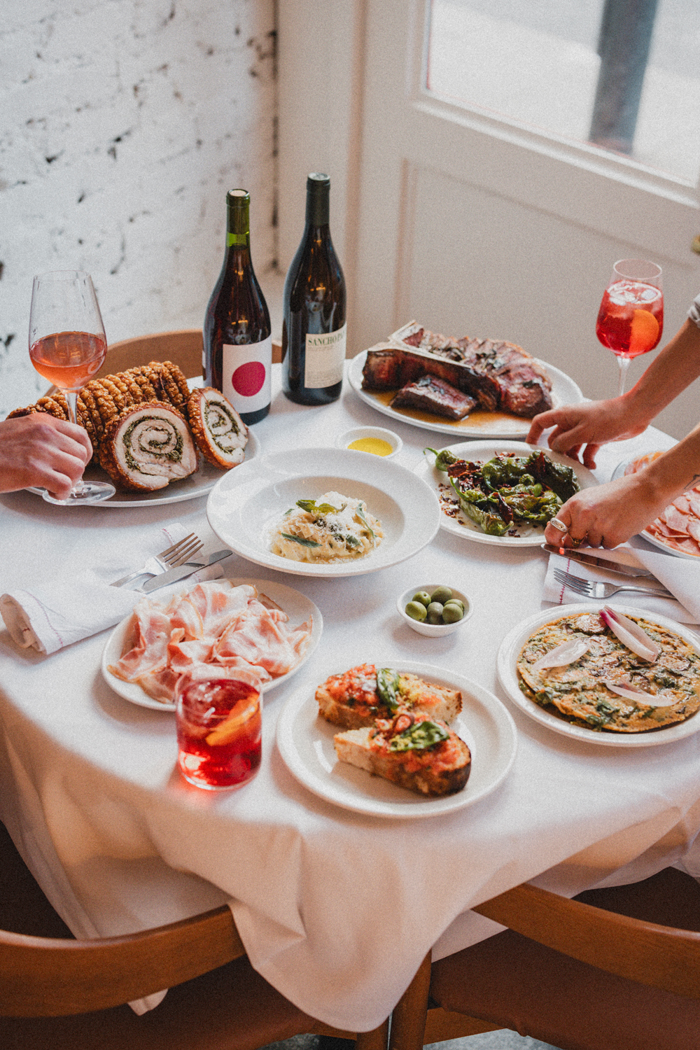 Lots of dishes on the table at Casa Felicia