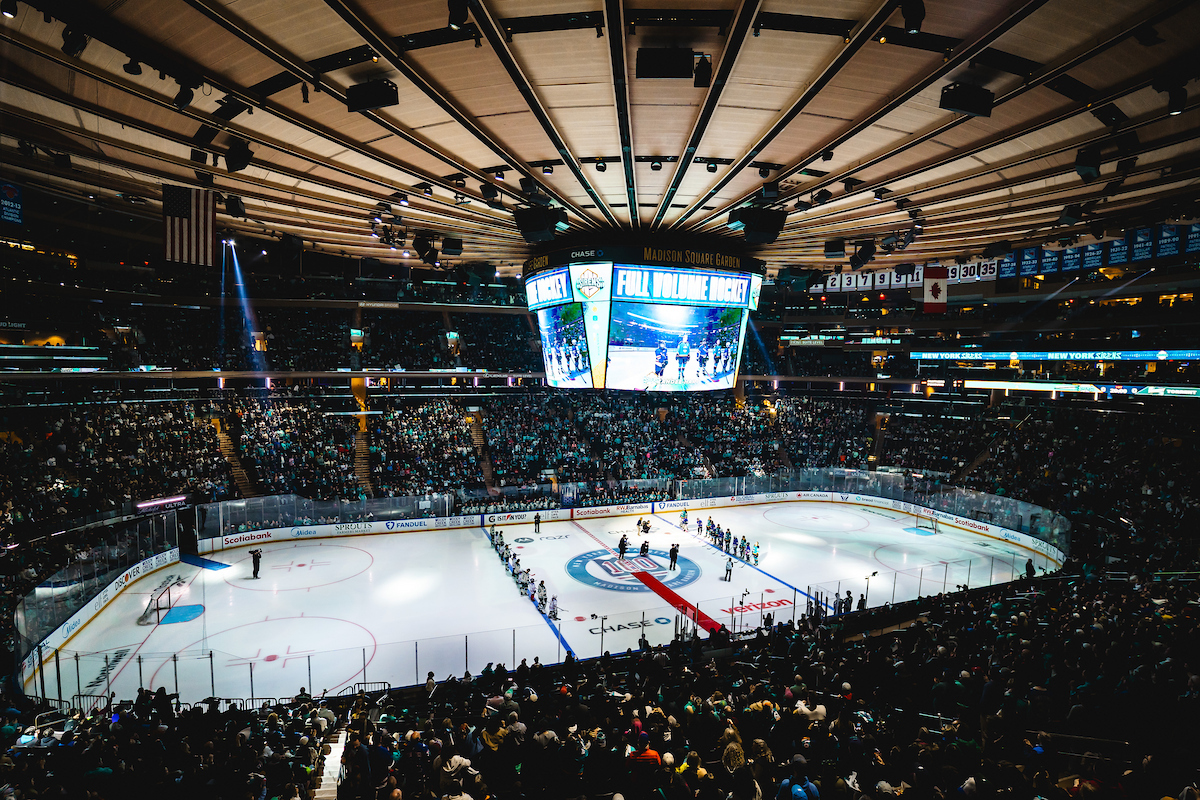 fans watching women's hockey game at MSG