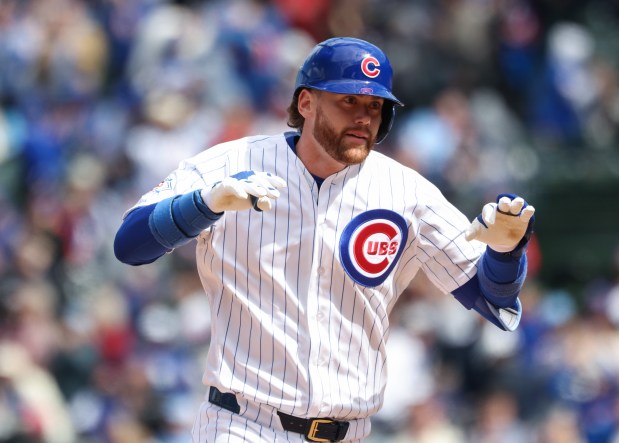 Cubs pinch hitter Carson Kelly rounds the bases after hitting a three-run home run in the sixth inning against the Mets on Saturday, April 18, 2026, at Wrigley Field. (John J. Kim/Chicago Tribune)