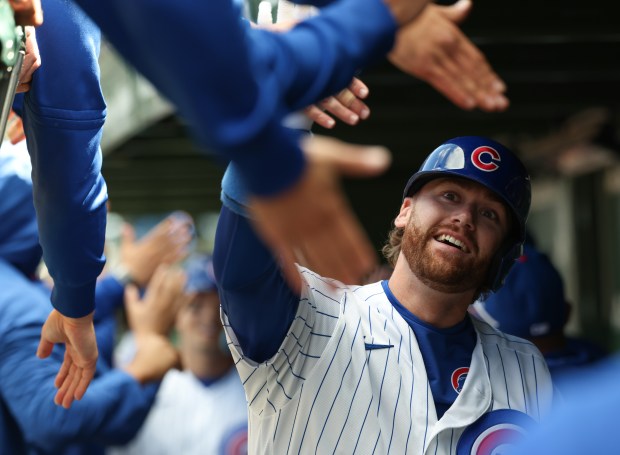 Cubs pinch hitter Carson Kelly celebrates after hitting a three-run home run in the sixth inning against the Mets on Saturday, April 18, 2026, at Wrigley Field. (John J. Kim/Chicago Tribune)
