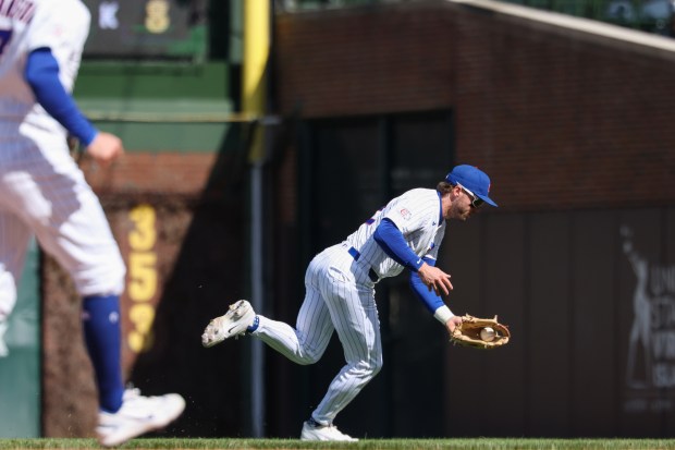 Cubs second baseman Nico Hoerner fields a ball hit by Mets catcher Francisco Alvarez in the eighth inning Saturday, April 18, 2026, at Wrigley Field. (John J. Kim/Chicago Tribune)