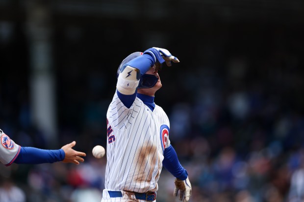 Cubs center fielder Pete Crow-Armstrong (4) celebrates after hitting a triple during the third inning against the Mets at Wrigley Field April 19, 2026, in Chicago. (Armando L. Sanchez/Chicago Tribune)