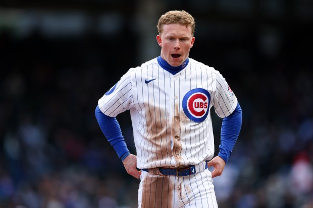 Cubs center fielder Pete Crow-Armstrong (4) walks to the dugout after getting tagged out in a double play during the third inning against the Mets at Wrigley Field April 19, 2026, in Chicago. (Armando L. Sanchez/Chicago Tribune)