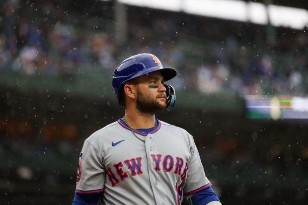 Mets shortstop Bo Bichette (19) walks to the dugout after being struck out during the first inning against the Cubs at Wrigley Field April 19, 2026, in Chicago. (Armando L. Sanchez/Chicago Tribune)