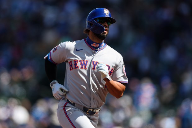 Mets left fielder Mj Melendez (1) runs the bases after hitting a solo-homer during the fifth inning against the Cubs at Wrigley Field April 19, 2026, in Chicago. (Armando L. Sanchez/Chicago Tribune)