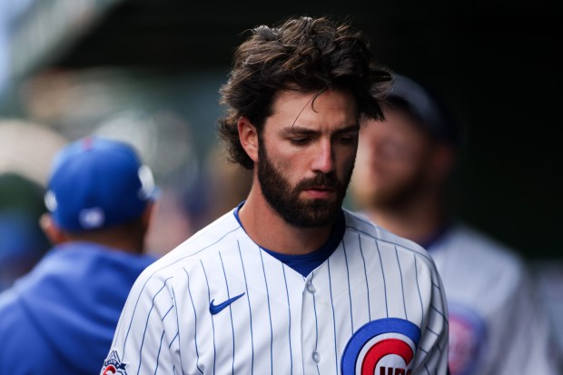 Cubs shortstop Dansby Swanson (7) walks through the dugout during the seventh inning against the Mets at Wrigley Field April 19, 2026, in Chicago. (Armando L. Sanchez/Chicago Tribune)