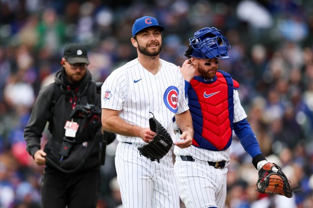 Cubs pitcher Corbin Martin (38) walks to the dugout after pitching during the ninth inning against the Mets at Wrigley Field April 19, 2026, in Chicago. (Armando L. Sanchez/Chicago Tribune)