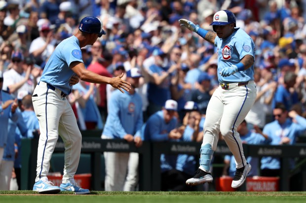 Chicago Cubs designated hitter Moisés Ballesteros (25) celebrates as he rounds the bases after hitting a three-run homer in the first inning of a game against the New York Mets at Wrigley Field in Chicago on April 17, 2026. (Chris Sweda/Chicago Tribune)