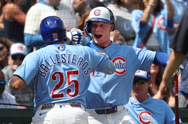 Chicago Cubs designated hitter Moisés Ballesteros (25) is congratulated by teammate Pete Crow-Armstrong after Ballesteros hit a three-run homer in the first inning of a game against the New York Mets at Wrigley Field in Chicago on April 17, 2026. (Chris Sweda/Chicago Tribune)