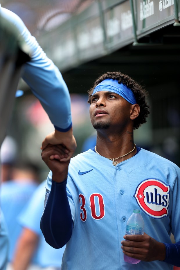 Chicago Cubs starting pitcher Edward Cabrera (30) is congratulated by his teammates in the dugout after finishing off the New York Mets in the sixth inning of a game at Wrigley Field in Chicago on April 17, 2026. (Chris Sweda/Chicago Tribune)