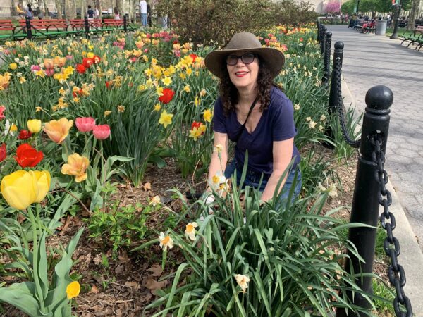 Cadman Park Conservancy President Doreen Gallo, in a wonderland of spring tulips in in Cadman Plaza Park’s Juneteenth Grove. Mulch Fest takes place this Saturday. Photo: Mary Frost/Brooklyn Eagle