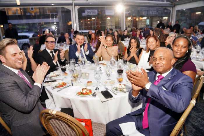 people sitting around a dining table