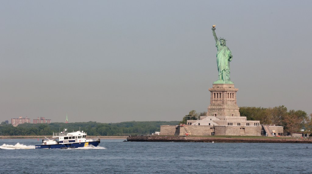 Use Pier A for Statue of Liberty ferries and clear out the illegal hawkers