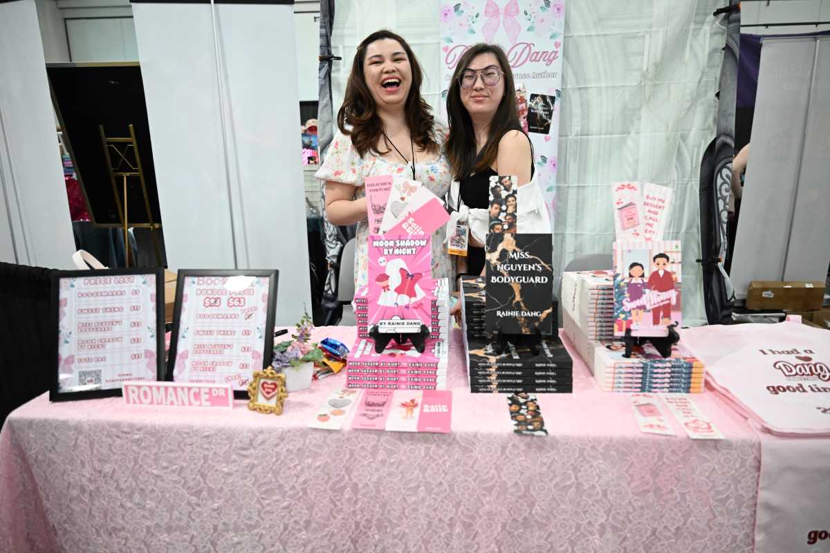 Author Rainie Dang (left) at her booth at BookCon.