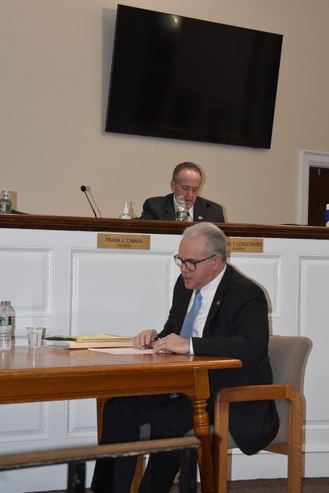 Trustee Michael Longobardi (Top) and Village Clerk Joseph O'Grady during the recent meeting.