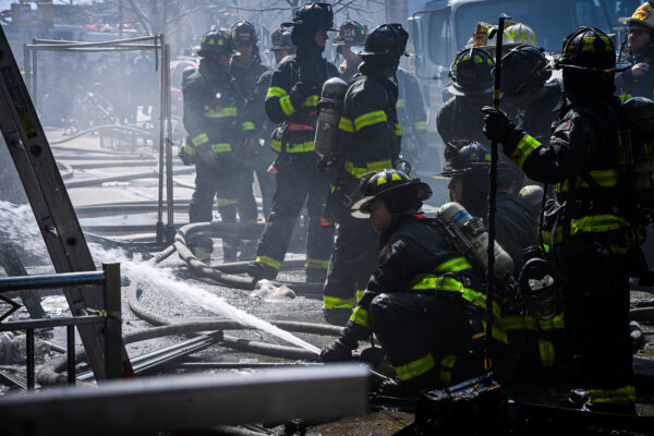 A three-alarm fire broke out at 5311 Fort Hamilton Parkway at 1:45 p.m. on Sunday. Photo: Marc A. Hermann