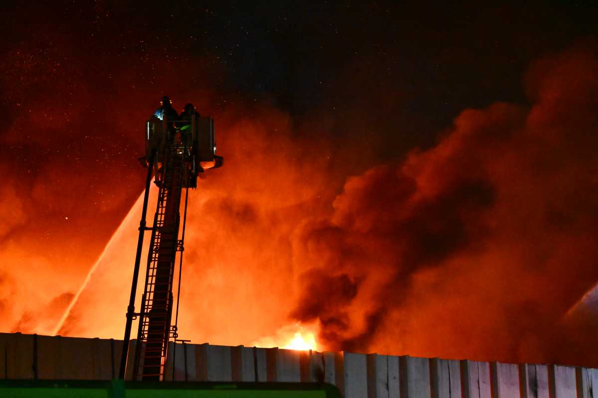 Massive five-alarm fire in Queens destroys lumberyard; cause under investigation