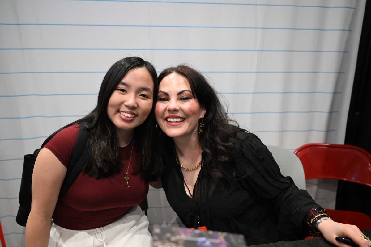 Author Scarlett St. Clair meets with a fan at BookCon.