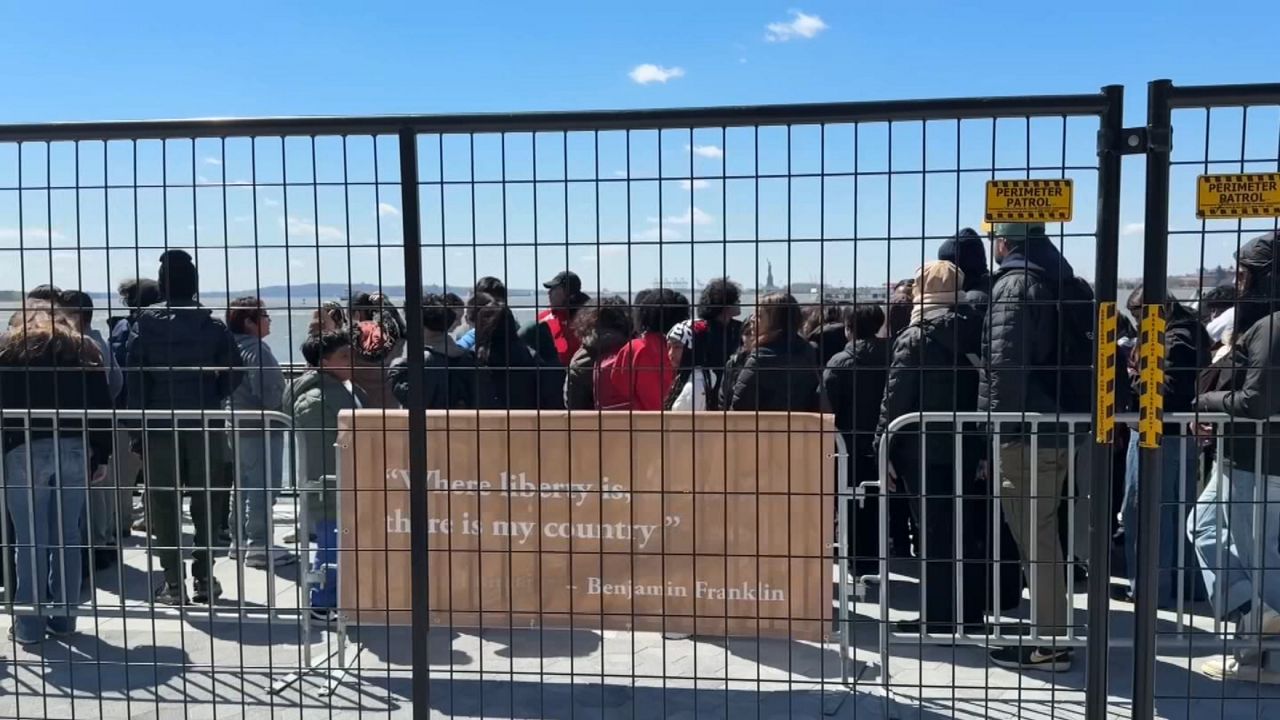 According to the U.S. Park Police, security fencing around the sightseeing cruise boats has taken up the same space at Battery Park since 2004. (Spectrum News NY1)