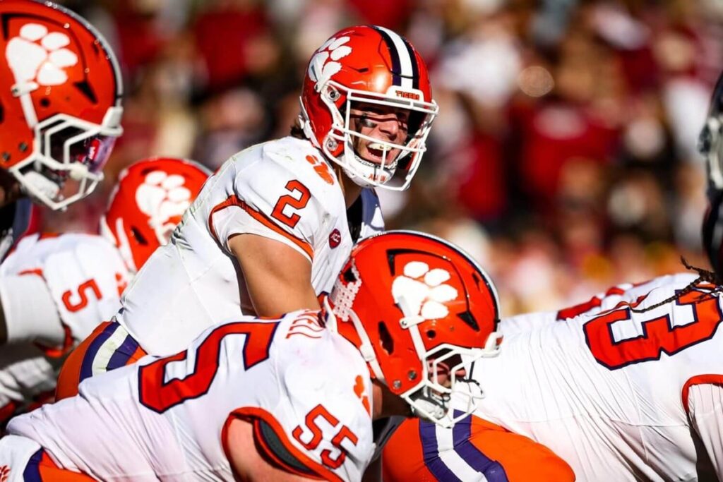 Clemson quarterback Cade Klubnik calls out instructions at the line of scrimmage before the snap.