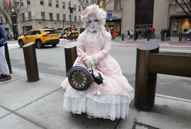 People participate in the annual Easter Parade and Bonnet Festival on Fifth Avenue in New York City on April 5, 2026. (Photo by TIMOTHY A. CLARY / AFP via Getty Images)