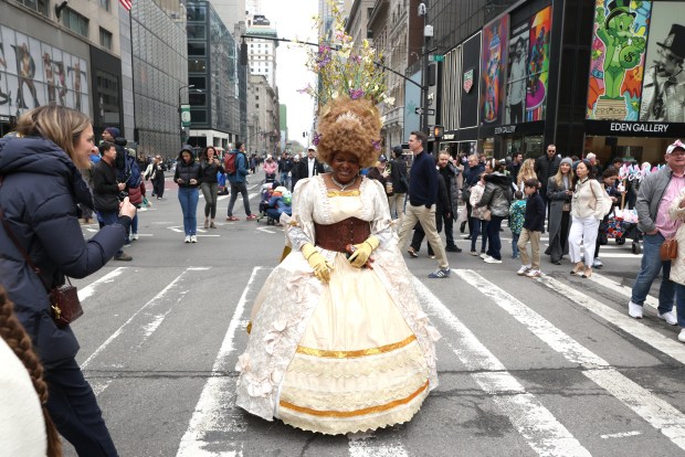 People participate in the annual Easter Parade and Bonnet Festival on Fifth Avenue in New York City on April 5, 2026. (Photo by TIMOTHY A. CLARY / AFP via Getty Images)