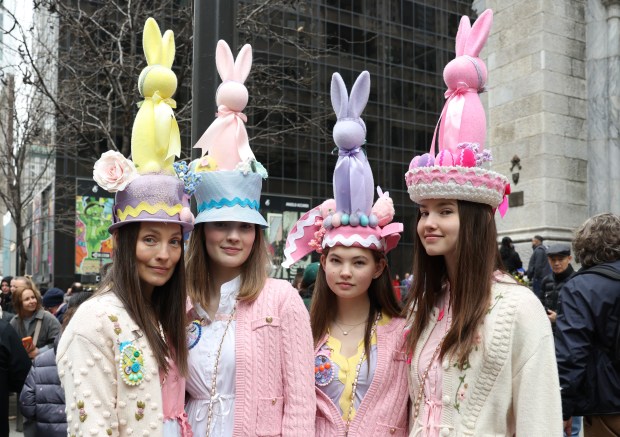 A family participates in the annual Easter Parade and Bonnet Festival on Fifth Avenue in New York City on April 5, 2026. (Photo by TIMOTHY A. CLARY / AFP via Getty Images)