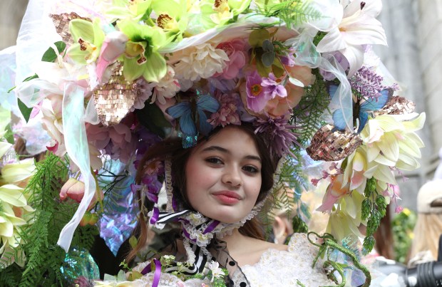 A woman participates in the annual Easter Parade and Bonnet Festival on Fifth Avenue in New York City on April 5, 2026. (Photo by TIMOTHY A. CLARY / AFP via Getty Images)