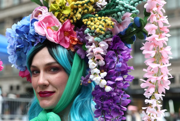 A woman participates in the annual Easter Parade and Bonnet Festival on Fifth Avenue in New York City on April 5, 2026. (Photo by TIMOTHY A. CLARY / AFP via Getty Images)